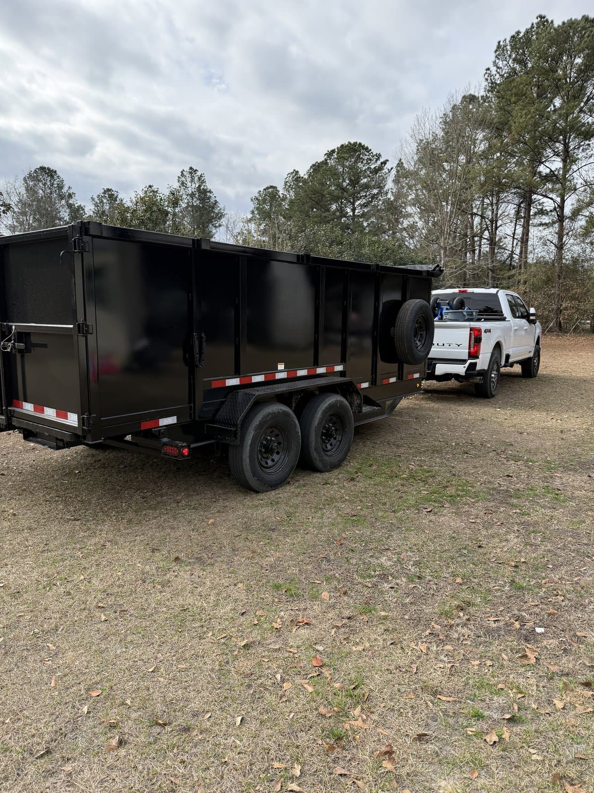 Precision Waste Removal dump trailer and truck